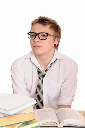 simsearch:400-04829236,k - teenager student sits behind a desk isolated on white background Stock Photo - Budget Royalty-Free & Subscription, Code: 400-06063566