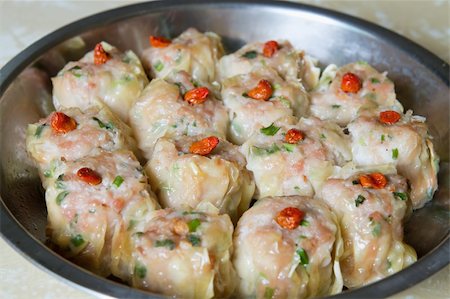 Steamed Shu Mai Pork and Shrimp Dumplings Closeup Stock Photo - Budget Royalty-Free & Subscription, Code: 400-06063657