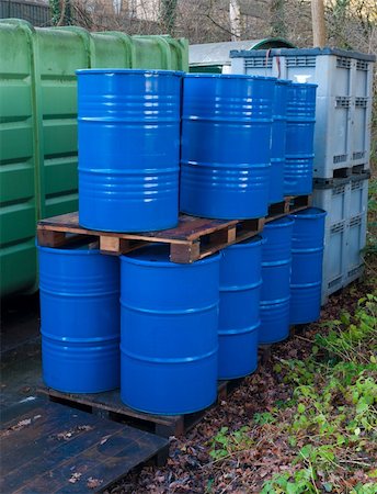 blue empty oil drums on an outside storage place Stock Photo - Budget Royalty-Free & Subscription, Code: 400-06063750