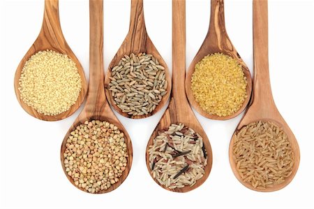 Cereal and grain selection of bulgur wheat, buckwheat, couscous, rye grain and brown and wild rice in olive wood spoons on white background. Stock Photo - Budget Royalty-Free & Subscription, Code: 400-06063958