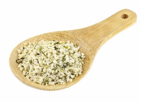 shelled hemp seeds on a small bamboo spoon isolated on white Stock Photo - Budget Royalty-Free & Subscription, Code: 400-06063966