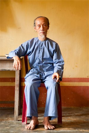 elderly asian faces - Vietnamese monk in the Phi Lai temple in Ba Chuc, Mekong Delta, Vietnam Stock Photo - Budget Royalty-Free & Subscription, Code: 400-06074097