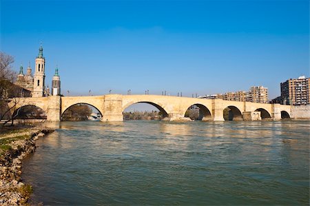 Stone Bridge Over The River Ebro In Zaragoza, Spain Stock Photo - Budget Royalty-Free & Subscription, Code: 400-06074255