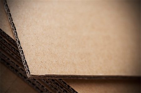 brown corrugated cardboard sheet close up with blur effect Stock Photo - Budget Royalty-Free & Subscription, Code: 400-06075021