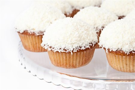 Sweet white cupcake with coconut and lemon Stock Photo - Budget Royalty-Free & Subscription, Code: 400-06075721