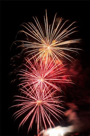 red colour background with white fireworks - A colorful fireworks display,Independence Day U.S.A. Stock Photo - Budget Royalty-Free & Subscription, Code: 400-06075723