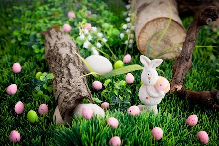 public sun - Colorful Easter eggs. Holiday nature concept with easter hunt. Eggs in the sunny meadow Stock Photo - Budget Royalty-Free & Subscription, Code: 400-06075820
