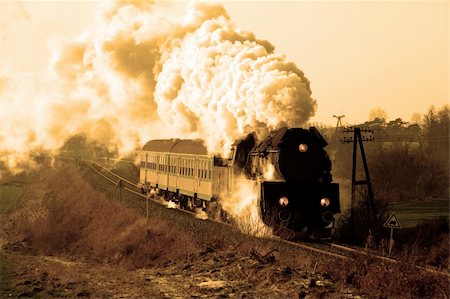 simsearch:862-03288971,k - Vintage steam train passing through countryside, wintertime Stock Photo - Budget Royalty-Free & Subscription, Code: 400-06075861