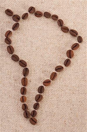 Map of South America made out of coffee beans on canvas Fotografie stock - Microstock e Abbonamento, Codice: 400-06075996