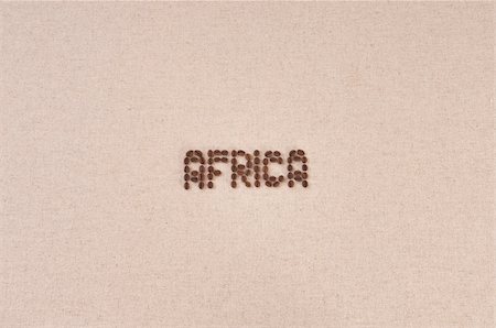 Canvas background with coffee beans forming the word Africa Fotografie stock - Microstock e Abbonamento, Codice: 400-06076129