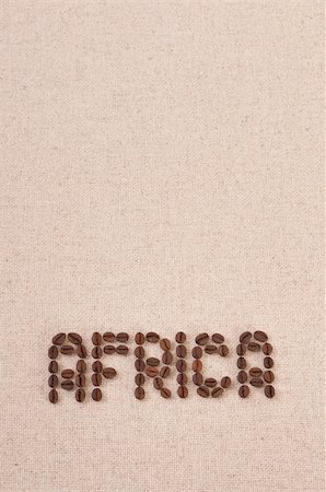 The word Africa written with selected coffee beans on canvas background Fotografie stock - Microstock e Abbonamento, Codice: 400-06076130