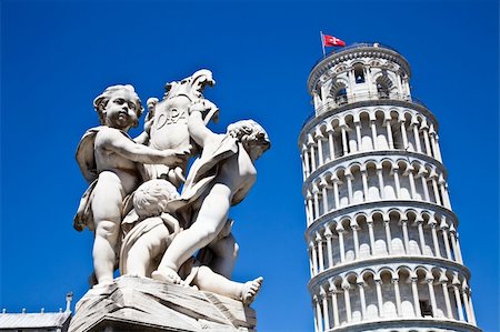 roman towers - Italy - Pisa. The famous leaning tower on a perfect blue bakcground Stock Photo - Budget Royalty-Free & Subscription, Code: 400-06076686