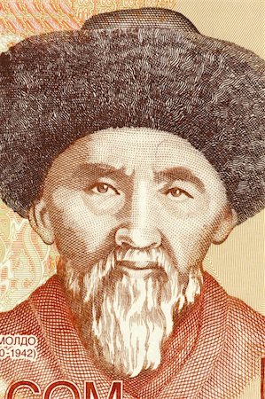 simsearch:400-06068319,k - Togolok Moldo (1860-1942) on 20 Som 2002 Banknote from Kyrgyzstan. Kyrgyz poet, Manaschi and folk song writer. Stockbilder - Microstock & Abonnement, Bildnummer: 400-06076759