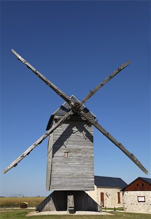 simsearch:400-06101286,k - Traditional wooden windmill in the Eure&Loir region of France.This windmill is "The big windmill from Ouarville". Stock Photo - Budget Royalty-Free & Subscription, Code: 400-06076814
