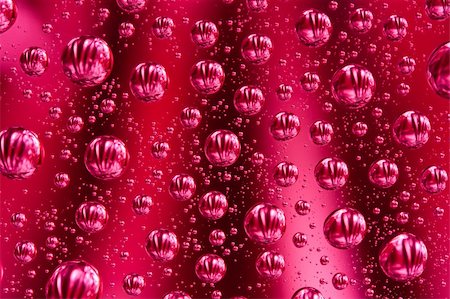 Abstract macro of water drops over red background Stock Photo - Budget Royalty-Free & Subscription, Code: 400-06076815