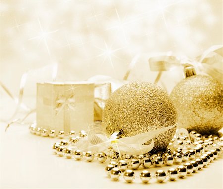 Golden Christmas ornaments with bokeh background Stock Photo - Budget Royalty-Free & Subscription, Code: 400-06076967