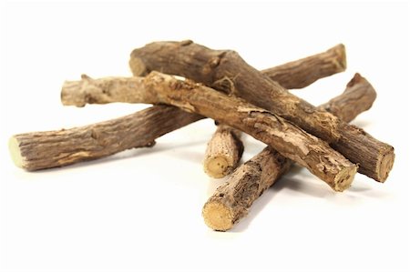 silencefoto (artist) - some pieces of licorice on a white background Stockbilder - Microstock & Abonnement, Bildnummer: 400-06076987