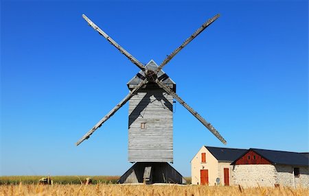 simsearch:400-06101286,k - Traditional wooden windmill in the Eure&Loir region of France.This windmill is "The big windmill from Ouarville". Stock Photo - Budget Royalty-Free & Subscription, Code: 400-06076991