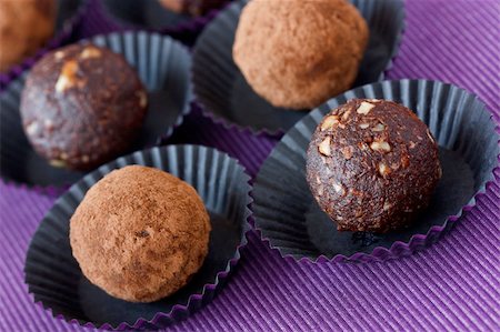 Homemade chocolate truffle on a lilac background. Stock Photo - Budget Royalty-Free & Subscription, Code: 400-06077160