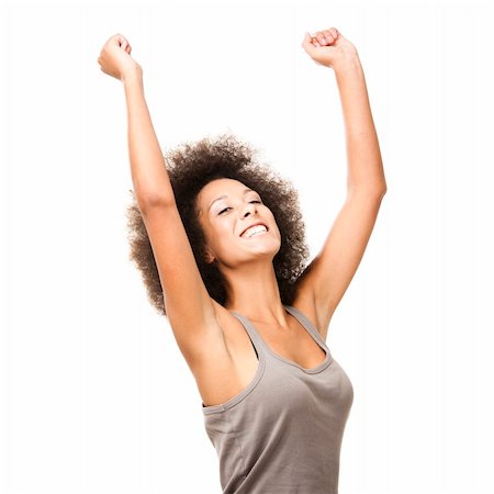 simsearch:400-06065810,k - Happy Afro-American young woman isolated on white with arms on the air Foto de stock - Super Valor sin royalties y Suscripción, Código: 400-06077579