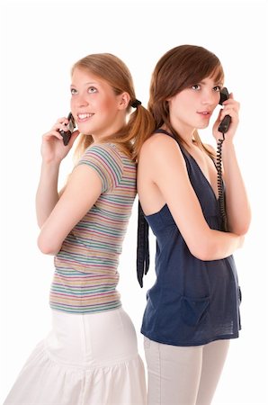 simsearch:400-04586228,k - Two friends communicate by phones isolated on white background Stock Photo - Budget Royalty-Free & Subscription, Code: 400-06077937