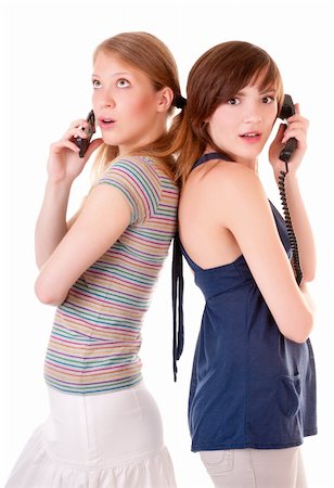 simsearch:400-04586228,k - Two friends communicate by phones isolated on white background Stock Photo - Budget Royalty-Free & Subscription, Code: 400-06077938