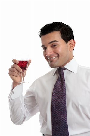 simsearch:400-04313696,k - Smiling man raising a glass of wine in celebration.  White background. Photographie de stock - Aubaine LD & Abonnement, Code: 400-06077953