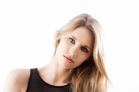 simsearch:400-05744994,k - beauty portrait of a young and beautiful blond girl with long hair and natural make up posing over white, she is in front of the camera, looks in to the lens and her head is bent at left Stock Photo - Budget Royalty-Free & Subscription, Code: 400-06078031