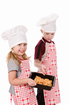 simsearch:400-06078465,k - two children in the chef's hat isolated on white background Stock Photo - Budget Royalty-Free & Subscription, Code: 400-06078457
