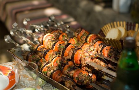 Kebab skewers with vegetables on a table close-up Stock Photo - Budget Royalty-Free & Subscription, Code: 400-06078532
