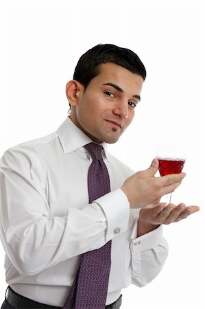 simsearch:400-04313696,k - A man or salesman presenting or showing a glass of wine.  White background. Photographie de stock - Aubaine LD & Abonnement, Code: 400-06078604