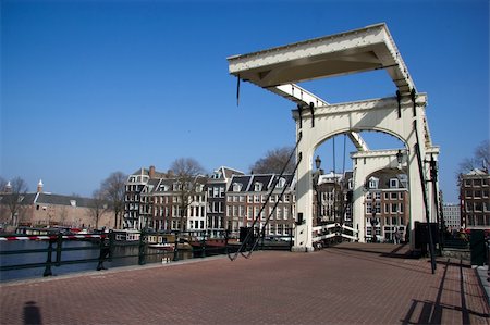 simsearch:400-08016418,k - A day shot of Magere Brug (skinny bridge) in Amsterdam Foto de stock - Super Valor sin royalties y Suscripción, Código: 400-06078692