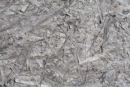 sciure - Close up of a recycled compressed wood chippings board Photographie de stock - Aubaine LD & Abonnement, Code: 400-06079054