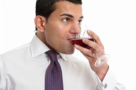 simsearch:400-04765778,k - A man drinking or wine tasting from a glass filled with wine Stock Photo - Budget Royalty-Free & Subscription, Code: 400-06079122