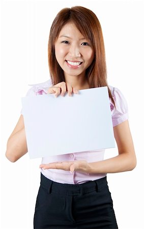 simsearch:400-06071690,k - Mixed race Asian woman holding a white board, ready for text Photographie de stock - Aubaine LD & Abonnement, Code: 400-06079297