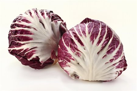 two radicchio on a white background Stock Photo - Budget Royalty-Free & Subscription, Code: 400-06079315