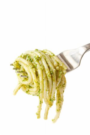 simsearch:400-04414168,k - Fresh hot spaghetti with pesto on a fork. Photographie de stock - Aubaine LD & Abonnement, Code: 400-06079353