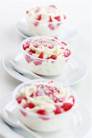 simsearch:400-04327162,k - Delicious vanilla ice cream in the cup with strawberry cream Stock Photo - Budget Royalty-Free & Subscription, Code: 400-06079662