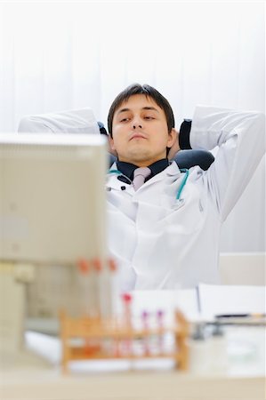 simsearch:400-04390415,k - Portrait of thoughtful medical doctor at office Stock Photo - Budget Royalty-Free & Subscription, Code: 400-06079753