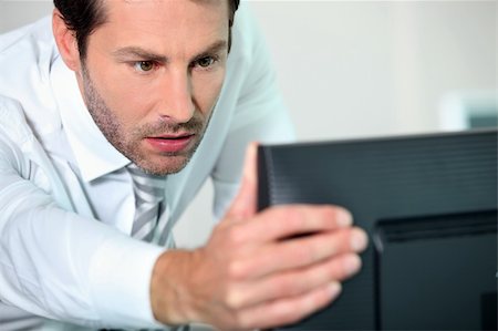 close-up of a man with computer Stock Photo - Budget Royalty-Free & Subscription, Code: 400-06079803