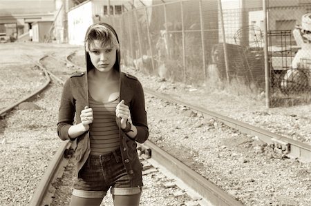 Sepia toned image of grunge style or run away girl. Stock Photo - Budget Royalty-Free & Subscription, Code: 400-06070023