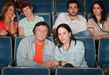 Group of upset audience watch movie in theater Stock Photo - Budget Royalty-Free & Subscription, Code: 400-06070073