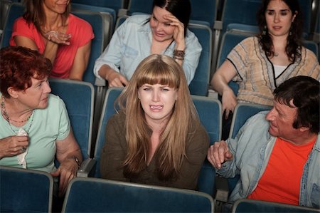 simsearch:400-05913577,k - Weeping woman and distracted people in the audience Stock Photo - Budget Royalty-Free & Subscription, Code: 400-06070081