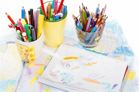 Abstract painting  and pen holders  with colored pens on a white background Stock Photo - Budget Royalty-Free & Subscription, Code: 400-06070378