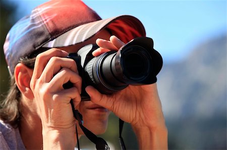 paparazzi taking pictures of man background - Man with photo camera taking pictures Photographie de stock - Aubaine LD & Abonnement, Code: 400-06071079