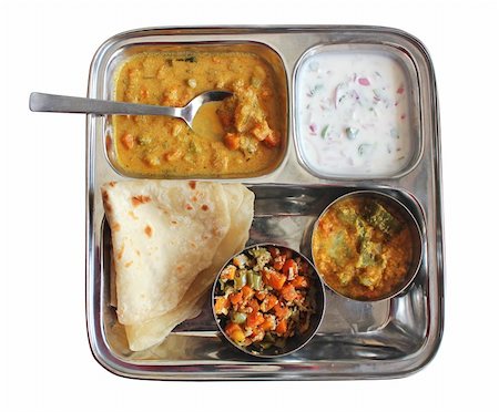 simsearch:400-08075728,k - Traditional Indian bread chapati with curries, raitha and salad isolated on white Photographie de stock - Aubaine LD & Abonnement, Code: 400-06071355