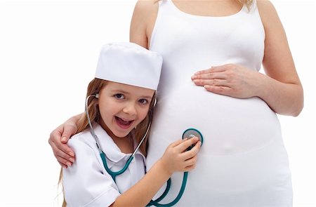 pregnant sisters - Little girl excited about her coming sibling - listening to mother's tummy Stock Photo - Budget Royalty-Free & Subscription, Code: 400-06071399