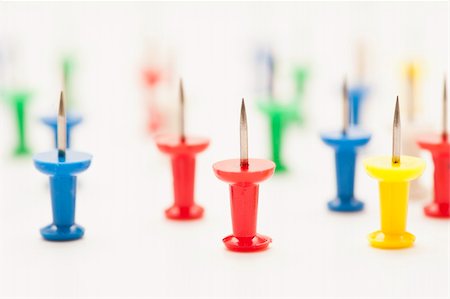 sharp objects - Many colorful push pins with the sharp end pointing up Stock Photo - Budget Royalty-Free & Subscription, Code: 400-06071486