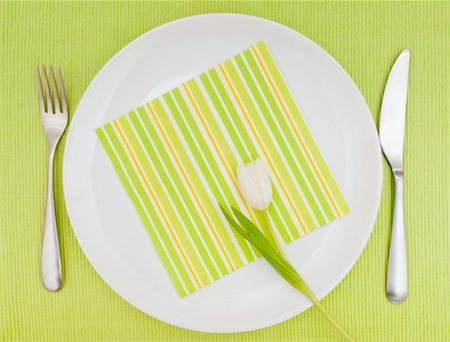 pastel dish - Set Table With Fork, Knife and Tulip on White Plate Stock Photo - Budget Royalty-Free & Subscription, Code: 400-06071655