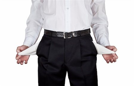 simsearch:400-07305634,k - L'homme d'affaires transforme ses poches de pantalon vide Photographie de stock - Aubaine LD & Abonnement, Code: 400-06071714